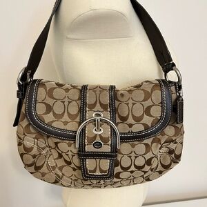 Authentic Coach shoulder bag. Includes dust bag.